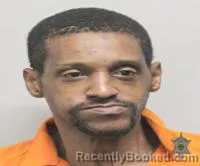 Mugshot of NATHANIEL TRINITY BENJAMIN booked in Lafayette County, Louisiana on July 22, 2026