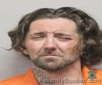 Mugshot of Coty James Jacquneaux booked in Lafayette County, Louisiana on July 25, 2026