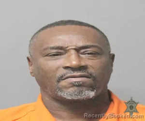 Mugshot of Davic Dwayne Poydras booked in Lafayette County, Louisiana on July 27, 2026