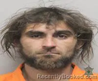 Mugshot of Justin Paul Dupuis booked in Lafayette County, Louisiana on July 28, 2026
