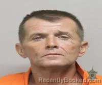 Mugshot of MICHAEL JOSPEH MENARD booked in Lafayette County, Louisiana on August 4, 2026