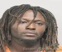 Mugshot of Travis Mouton booked in Lafayette County, Louisiana on August 27, 2026
