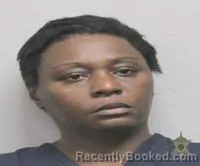 Mugshot of Artonia Marie Johnson booked in Lafayette County, Louisiana on October 1, 2026