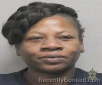 Mugshot of Karon Renee Burgess booked in Lafayette County, Louisiana on October 3, 2026