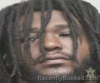 Mugshot of Justin Williams booked in Lafayette County, Louisiana on October 20, 2026