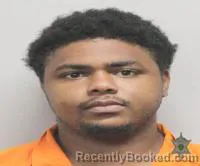Mugshot of Dontravian Christopher Brown booked in Lafayette County, Louisiana on October 23, 2026