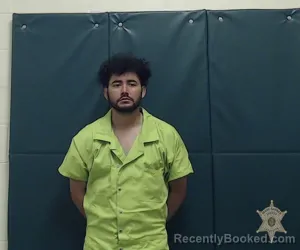 Mugshot of YEINIER ENRIQUEZ-REYES booked in Lafayette County, Louisiana on March 29, 2026