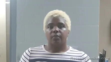 Mugshot of Akeisha Jamese Kelly booked in Livingston County, Louisiana on October 7, 2026