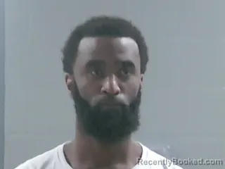 Mugshot of JUSTIN RAINEY