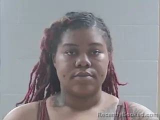 Mugshot of CHRISTINA BUTLER booked in Livingston County, Louisiana on May 7, 2026