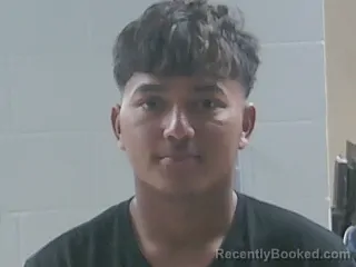 Mugshot of Carlos Ernesto Flores Rodriguez booked in Livingston County, Louisiana on August 18, 2026