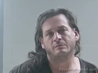 Mugshot of JASON RAYMOND COOK booked in Livingston County, Louisiana on April 25, 2026