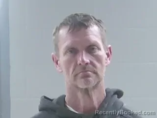 Mugshot of CLAYTON A WALKER