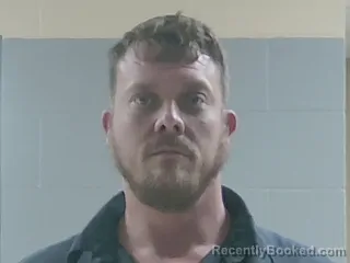 Mugshot of DUSTIN SAVIGNOL