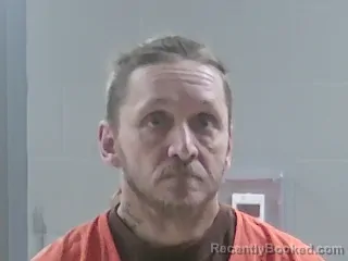 Mugshot of DONOVAN JOHN DRONET