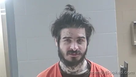 Mugshot of Ian Scamardo booked in Livingston County, Louisiana on September 29, 2026