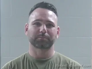 Mugshot of JUSTIN L BURNS booked in Livingston County, Louisiana on May 15, 2026