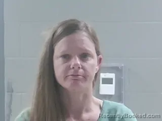 Mugshot of ASHLEY ANN SCHMIDT booked in Livingston County, Louisiana on May 7, 2026