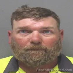 Mugshot of JOHN TRAVIS HOWARD