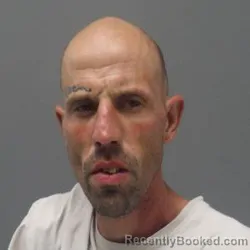 Mugshot of Justin Wayne Adams booked in Ouachita County, Louisiana on July 27, 2026
