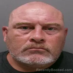 Mugshot of John Travis Taylor booked in Ouachita County, Louisiana on July 27, 2026