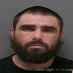 Mugshot of Justin Daniel Plunkett booked in Ouachita County, Louisiana on August 13, 2026