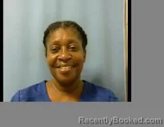 Mugshot of JUNE E CARMOUCHE