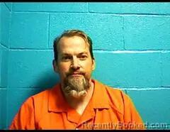 Mugshot of TRACY T HATCH