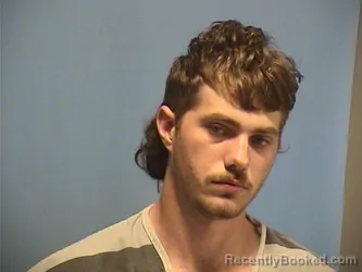 Mugshot of CALEB RIZAN booked in St Tammany County, Louisiana on March 19, 2026