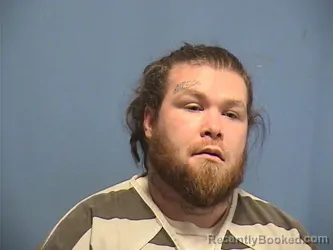 Mugshot of AUSTYN REYNOLDS booked in St Tammany County, Louisiana on March 24, 2026