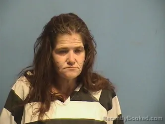 Mugshot of PATRICIA CUCCIA booked in St Tammany County, Louisiana on April 14, 2026