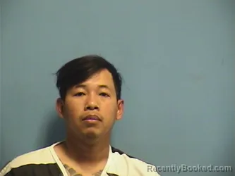 Mugshot of TRUNG LY booked in St Tammany County, Louisiana on May 12, 2026