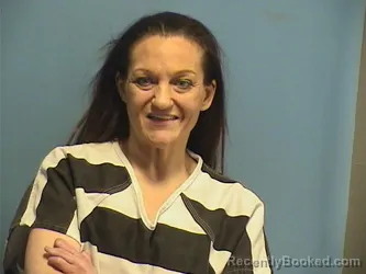 Mugshot of CHRISTINA PEREZ booked in St Tammany County, Louisiana on May 17, 2026