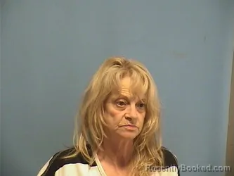 Mugshot of LESLEY BENSON booked in St Tammany County, Louisiana on May 20, 2026