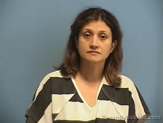 Mugshot of KAREN ROSALES booked in St Tammany County, Louisiana on May 27, 2026
