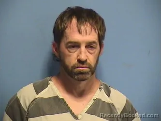 Mugshot of TRAVIS GILL booked in St Tammany County, Louisiana on July 21, 2026