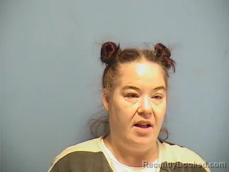 Mugshot of CHRISTINE NOLAN booked in St Tammany County, Louisiana on July 24, 2026