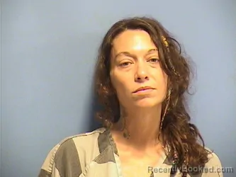 Mugshot of ASHLEY LOWE booked in St Tammany County, Louisiana on July 26, 2026