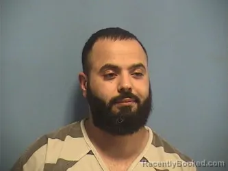 Mugshot of Mohammad Adhami booked in St Tammany County, Louisiana on September 15, 2026