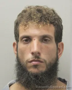 Mugshot of CODY JAMES REVETT