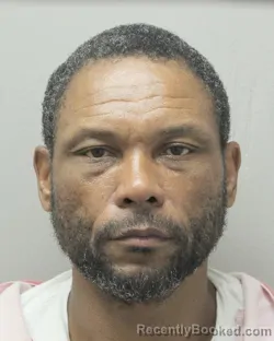 Mugshot of MERLIN GERMAINE HILL