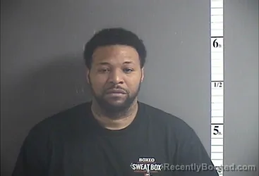 Mugshot of DENZEL J COSTIN