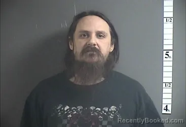 Mugshot of HOWARD C TOMLIN