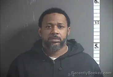 Mugshot of AAZIM M LOVE