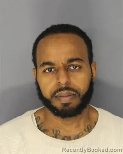 Mugshot of AL-RAHMAN ORE