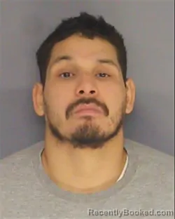 Mugshot of JUAN E CARMONA