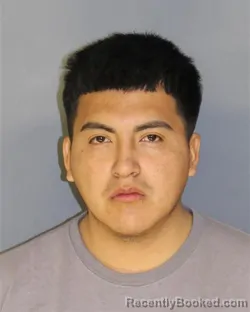 Mugshot of MAX PATINOGUANUQUIZA