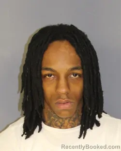 Mugshot of AKMID HENDERSON booked in Essex County, New Jersey on March 11, 2026