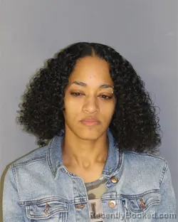 Mugshot of LETZIE CRUZ booked in Essex County, New Jersey on March 13, 2026