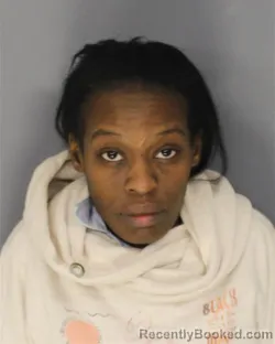 Mugshot of EMILY A COOTE booked in Essex County, New Jersey on March 22, 2026